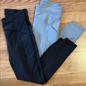 2 pairs Lululemon 25” Pants - Black and Gray